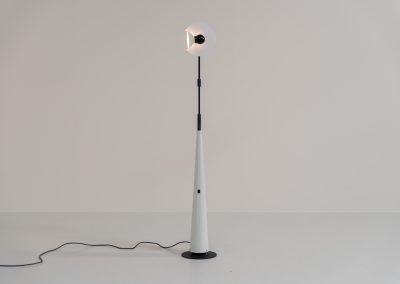 Stunning pair of “Club 1095” floor lamps by Giuseppe Ramella for Arteluce (Italy, 1980s). A beautiful example of Italian minimalist design, the Club 1095 combines a clean, architectural silhouette with a highly functional design. The height of the lamp is adjustable, while the diffuser can be angled to direct the light exactly where it is needed. With their understated presence and timeless aesthetic, these lamps work beautifully in both contemporary and more eclectic interiors, equally striking as a pair or as a standalone piece. Both lamps are in excellent vintage condition. Available individually or as a pair.