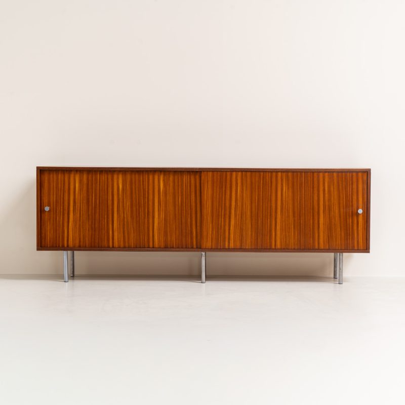 Sideboard in rosewood by Alfred Hendrickx for Belform (Belgium, 1960s). This minimalist sideboard, designed by the renowned Belgian modernist Alfred Hendrickx, is crafted out of rosewood and has an absolutely beautiful woodgrain. The sideboard features two large sliding doorsand lots of storage space on the inside. This example is in beautiful condition with only minor using traces.