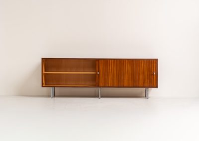 Sideboard in rosewood by Alfred Hendrickx for Belform (Belgium, 1960s). This minimalist sideboard, designed by the renowned Belgian modernist Alfred Hendrickx, is crafted out of rosewood and has an absolutely beautiful woodgrain. The sideboard features two large sliding doorsand lots of storage space on the inside. This example is in beautiful condition with only minor using traces.