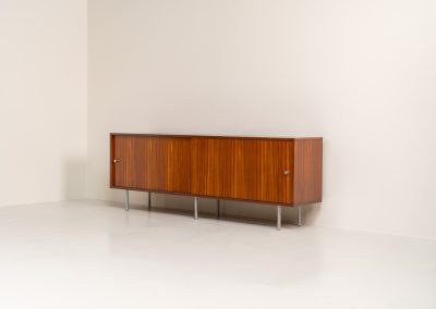 Sideboard in rosewood by Alfred Hendrickx for Belform (Belgium, 1960s). This minimalist sideboard, designed by the renowned Belgian modernist Alfred Hendrickx, is crafted out of rosewood and has an absolutely beautiful woodgrain. The sideboard features two large sliding doorsand lots of storage space on the inside. This example is in beautiful condition with only minor using traces.