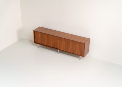 Sideboard in rosewood by Alfred Hendrickx for Belform (Belgium, 1960s). This minimalist sideboard, designed by the renowned Belgian modernist Alfred Hendrickx, is crafted out of rosewood and has an absolutely beautiful woodgrain. The sideboard features two large sliding doorsand lots of storage space on the inside. This example is in beautiful condition with only minor using traces.