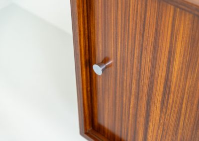 Sideboard in rosewood by Alfred Hendrickx for Belform (Belgium, 1960s). This minimalist sideboard, designed by the renowned Belgian modernist Alfred Hendrickx, is crafted out of rosewood and has an absolutely beautiful woodgrain. The sideboard features two large sliding doorsand lots of storage space on the inside. This example is in beautiful condition with only minor using traces.