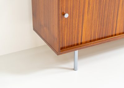 Sideboard in rosewood by Alfred Hendrickx for Belform (Belgium, 1960s). This minimalist sideboard, designed by the renowned Belgian modernist Alfred Hendrickx, is crafted out of rosewood and has an absolutely beautiful woodgrain. The sideboard features two large sliding doorsand lots of storage space on the inside. This example is in beautiful condition with only minor using traces.