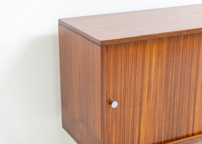 Sideboard in rosewood by Alfred Hendrickx for Belform (Belgium, 1960s). This minimalist sideboard, designed by the renowned Belgian modernist Alfred Hendrickx, is crafted out of rosewood and has an absolutely beautiful woodgrain. The sideboard features two large sliding doorsand lots of storage space on the inside. This example is in beautiful condition with only minor using traces.