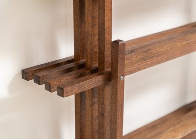 Sculptural wengé slat bookcase (Europe, 1960s). A sculptural bookcase defined by the rhythmic interplay of solid wengé slats and slender vertical supports. Its distinctive stepped construction, tapering towards the top, gives the piece an almost totemic presence. Both a functional piece of furniture and an architectural object. As we have been unable to find any documentation or comparable examples, this may well be a one-of-a-kind piece, reminiscent of the work of Fabrizio Mangoni. The bookcase is in beautiful vintage condition, with minor signs of age and use, including a few slightly warped slats.