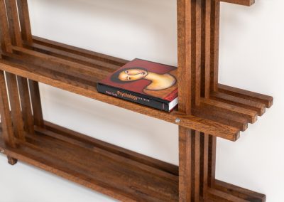 Sculptural wengé slat bookcase (Europe, 1960s). A sculptural bookcase defined by the rhythmic interplay of solid wengé slats and slender vertical supports. Its distinctive stepped construction, tapering towards the top, gives the piece an almost totemic presence. Both a functional piece of furniture and an architectural object. As we have been unable to find any documentation or comparable examples, this may well be a one-of-a-kind piece, reminiscent of the work of Fabrizio Mangoni. The bookcase is in beautiful vintage condition, with minor signs of age and use, including a few slightly warped slats.