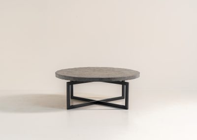 Coffee Table in Norwegian Slate stone, 1970s A very powerful brutalist coffee table from the 1970s, defined by its strong architectural presence and sculptural simplicity. The substantial tabletop is crafted from Norwegian slate, showcasing a rich and varied surface with natural tonal shifts that create depth and visual texture. The solid stone top is supported by a black lacquered metal base, offering a bold contrast while reinforcing the table’s grounded and monolithic character. The table remains in very good condition, with light, age-appropriate wear such as minor scratches to the frame.