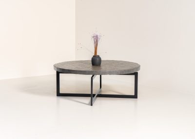 Coffee Table in Norwegian Slate stone, 1970s A very powerful brutalist coffee table from the 1970s, defined by its strong architectural presence and sculptural simplicity. The substantial tabletop is crafted from Norwegian slate, showcasing a rich and varied surface with natural tonal shifts that create depth and visual texture. The solid stone top is supported by a black lacquered metal base, offering a bold contrast while reinforcing the table’s grounded and monolithic character. The table remains in very good condition, with light, age-appropriate wear such as minor scratches to the frame.