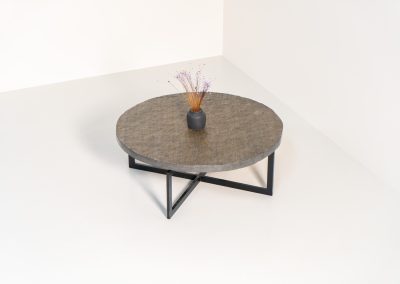 Coffee Table in Norwegian Slate stone, 1970s A very powerful brutalist coffee table from the 1970s, defined by its strong architectural presence and sculptural simplicity. The substantial tabletop is crafted from Norwegian slate, showcasing a rich and varied surface with natural tonal shifts that create depth and visual texture. The solid stone top is supported by a black lacquered metal base, offering a bold contrast while reinforcing the table’s grounded and monolithic character. The table remains in very good condition, with light, age-appropriate wear such as minor scratches to the frame.