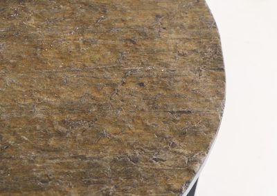 Coffee Table in Norwegian Slate stone, 1970s A very powerful brutalist coffee table from the 1970s, defined by its strong architectural presence and sculptural simplicity. The substantial tabletop is crafted from Norwegian slate, showcasing a rich and varied surface with natural tonal shifts that create depth and visual texture. The solid stone top is supported by a black lacquered metal base, offering a bold contrast while reinforcing the table’s grounded and monolithic character. The table remains in very good condition, with light, age-appropriate wear such as minor scratches to the frame.