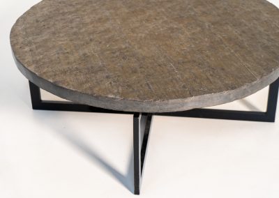 Coffee Table in Norwegian Slate stone, 1970s A very powerful brutalist coffee table from the 1970s, defined by its strong architectural presence and sculptural simplicity. The substantial tabletop is crafted from Norwegian slate, showcasing a rich and varied surface with natural tonal shifts that create depth and visual texture. The solid stone top is supported by a black lacquered metal base, offering a bold contrast while reinforcing the table’s grounded and monolithic character. The table remains in very good condition, with light, age-appropriate wear such as minor scratches to the frame.