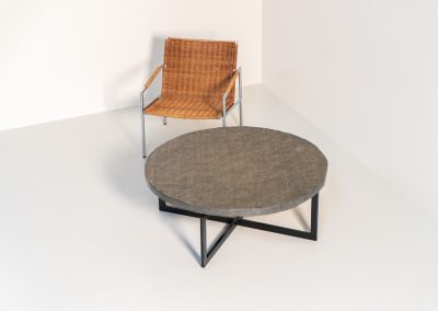Coffee Table in Norwegian Slate stone, 1970s A very powerful brutalist coffee table from the 1970s, defined by its strong architectural presence and sculptural simplicity. The substantial tabletop is crafted from Norwegian slate, showcasing a rich and varied surface with natural tonal shifts that create depth and visual texture. The solid stone top is supported by a black lacquered metal base, offering a bold contrast while reinforcing the table’s grounded and monolithic character. The table remains in very good condition, with light, age-appropriate wear such as minor scratches to the frame.