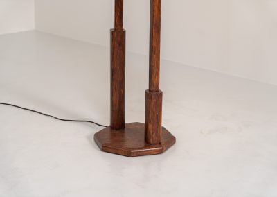 Wood & opal glass floor lamp, 1970s. Vintage floor lamp featuring a sculptural, geometric wooden base with two slender stems at different heights, each topped with a spherical opaline glass shade. The warm-toned wood and softly diffused light create a beautiful balance between architectural form and understated elegance. A distinctive vintage piece that works as both a functional light source and a sculptural accent in a contemporary or mid-century inspired interior. The lamp is in very good vintage condition overall, with a subtle historic repair to the wood near the base of one glass support.
