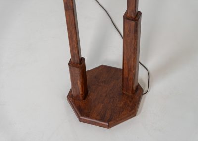 Wood & opal glass floor lamp, 1970s. Vintage floor lamp featuring a sculptural, geometric wooden base with two slender stems at different heights, each topped with a spherical opaline glass shade. The warm-toned wood and softly diffused light create a beautiful balance between architectural form and understated elegance. A distinctive vintage piece that works as both a functional light source and a sculptural accent in a contemporary or mid-century inspired interior. The lamp is in very good vintage condition overall, with a subtle historic repair to the wood near the base of one glass support.